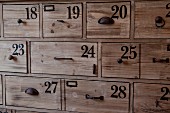 Full frame shot of numbers on wooden drawers; Azusa; California; USA
