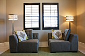 Floor lamps and seating below window; Valencia; California; USA