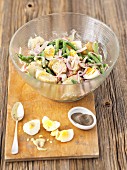 Potato salad with green beans, eggs, ham and a mustard dressing