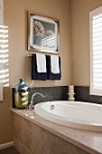 Oval bathtub in bathroom; Valencia; California; USA