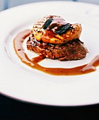 Beefsteak with grilled foie gras and black truffles