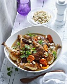 A bowl of chicken tagine with apricots and almonds