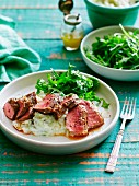 Lamb fillet with mashed cauliflower, pear and mint with a rocket salad