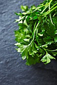 Fresh parsley on a slate surface