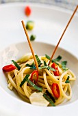 Spaghetti alla sorrentina (pasta with fish sauce, mint and chilli, Italy)