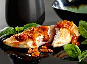 Chicken breast with pepper pesto and basil