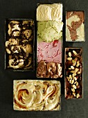 Various ice cream flavours in metal containers