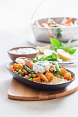 Moroccan vegetables on a bed of couscous with mint yoghurt