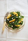 Green kale salad with oranges and feta cheese