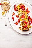 Meringue roulade with passion fruit and lime syrup