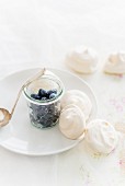 Delicate rosewater pavlovas with fresh blueberries
