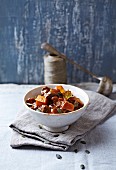 Beef goulash with pumpkin and mushrooms