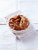 A mini yeast cake with plums, cinnamon and brown sugar