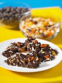 Chocolate crispy cakes with nuts and dried fruit