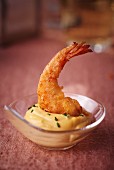 A prawn in a mayonnaise dip