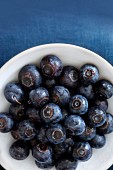 Blueberries on a white plate