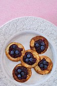 Mini pancakes with blueberries and blueberry jam
