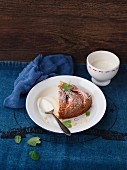 A sliced of layered apple cake with cream