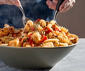 Fusilli with cauliflower and tomatoes