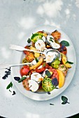 Fruity tomato salad with goat's cheese