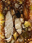 A close-up of halwa with figs, almonds and pistachios from Ambala, India