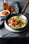 An omelette with quick tomato chutney