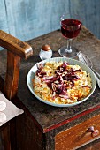 Carrot risotto with radicchio and pine nuts
