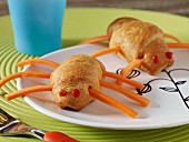 Stuffed croissants with cheese and ketchup (children's snack)