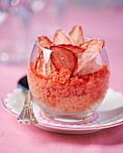 A portion of strawberry charlotte in a glass