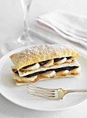 Banoffee layered pastries with icing sugar