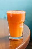 Carrot and apple juice with lemon, lime and ginger