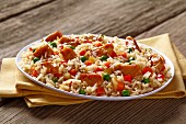 Rice with chicken, peas, carrots and peppers