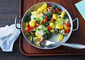 Gnocchi bake with spinach and tomatoes