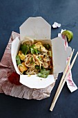 Pad Thai (rice noodle dish, Thailand) in a takeaway box