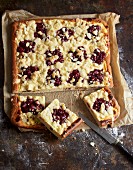 Butter cake with cherries and crumbles
