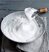 Beaten egg whites with a whisk