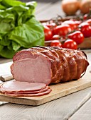 Roast ham on a wooden board