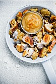 Kaiserschmarren (shredded sugared pancake from Austria) with apple purée