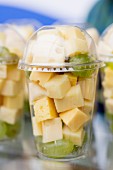 Cheese cubes and grapes in plastic pots to takeaway