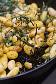 Rosemary potatoes in a pan (detail)