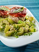 Fried pork fillet with sage and a cress-cucumber salad