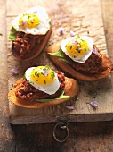 Dripping crostini with fried egg