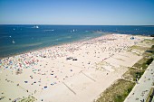 A view from Hotel Neptun of the popular beach and the entrance to the harbour at Warnemünde