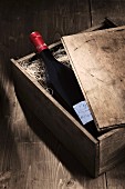 Red wine in a wooden box