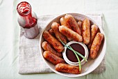 Fried sausages with plum-ginger sauce