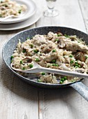 Fried rice with mushrooms, turkey and peas