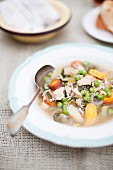 Vegetable soup with mushrooms and chicken