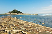 A cobbled path leading to St. Michaels Mount, a tidal island with a chapel in Cornwall (England)