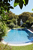 Oval pool in elegant garden