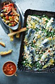 Oven-roasted sardines with lemon and flaked almonds